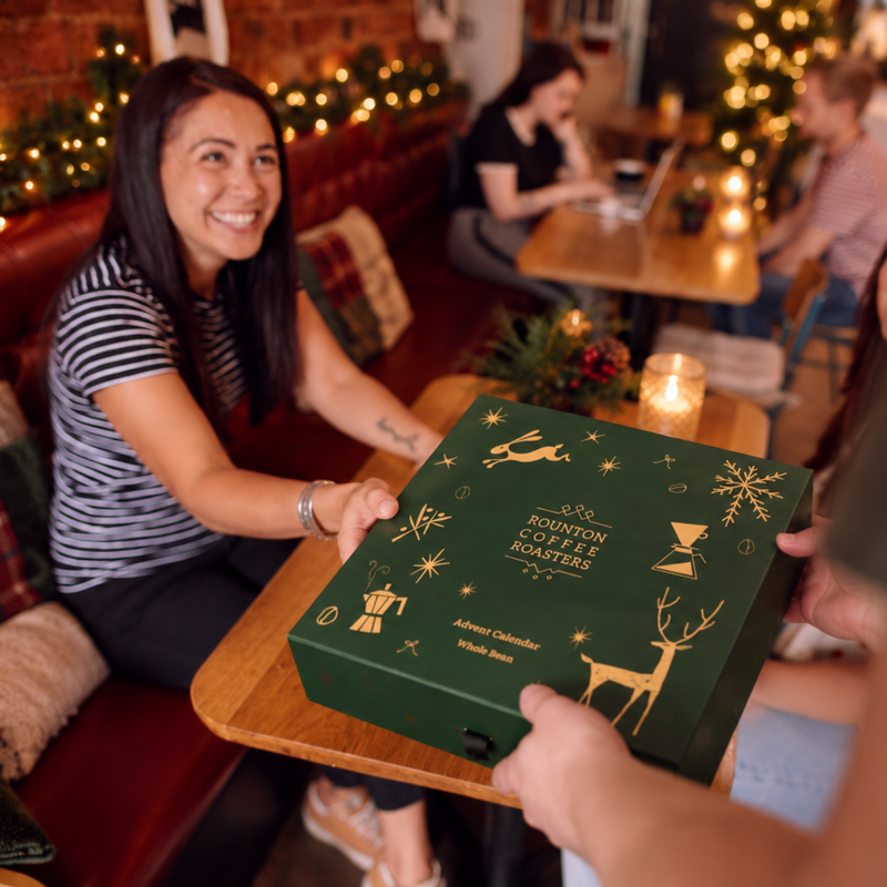 Coffee Advent Calendar with festive Christmas packaging in a cafe