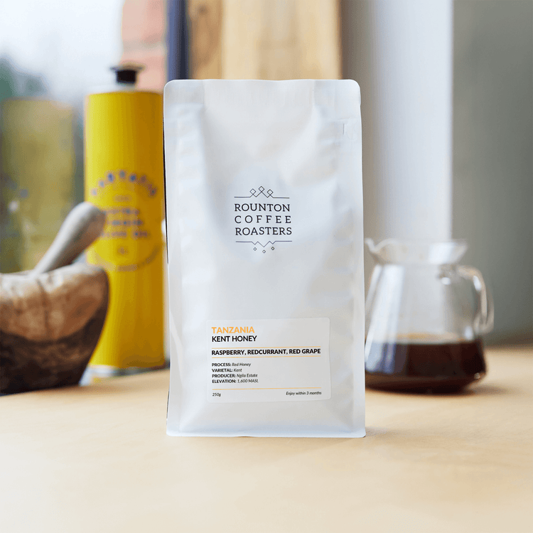 Simulated alt text for Kent Honey for rounton-coffee-store.myshopify.com. You are an expert SEO agent. You will generate an ALT text for this image. <Store_Context> Business Details: - Speciality coffee sustainably sourced and roasted...