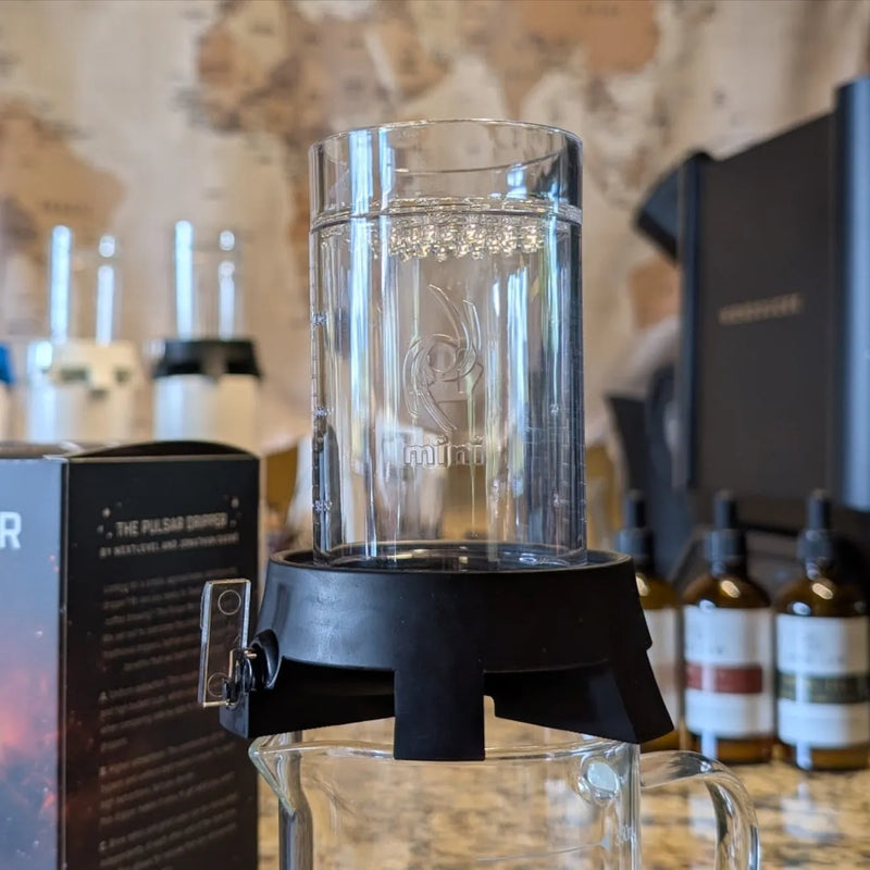 NextLevel Mini PULSAR™ Brewer atop a glass carafe