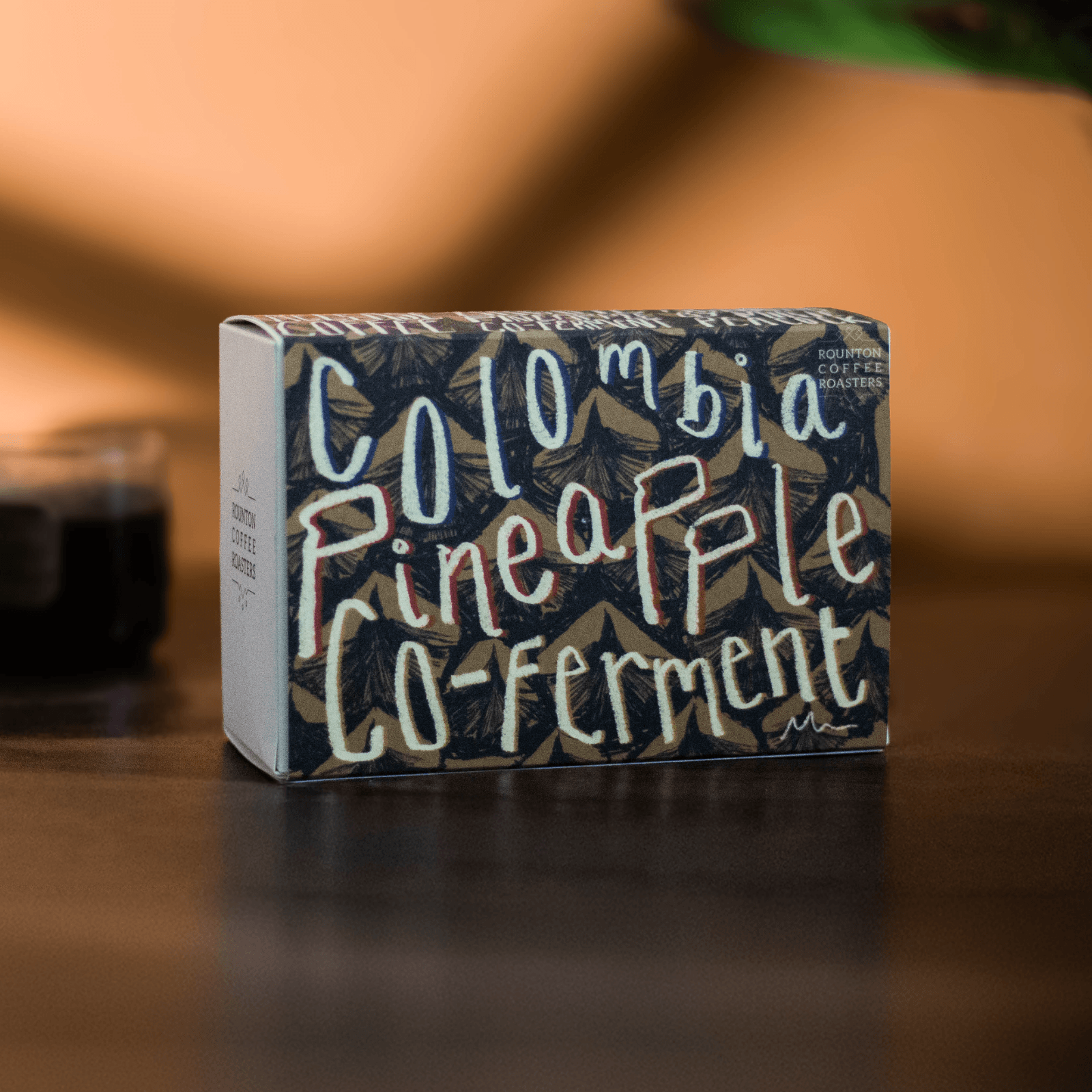 Pineapple Co-Ferment packaging with tropical design from Rounton Coffee Roasters