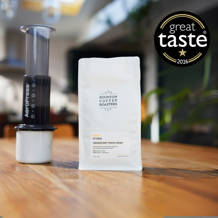 Two Stories coffee beans with Great Taste Award 2026 badge